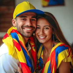 Foto op Canvas Happy young couple wearing national colombian colors © Tayyaba