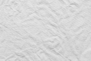 A sheet of white wrinkled tissue paper as background
