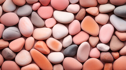 A collection of smooth, multi-colored pebbles, vary in shades of peach, pink and grey, creating aesthetically pleasing calming composition, for backgrounds, wallpapers, or design with natural touch - obrazy, fototapety, plakaty