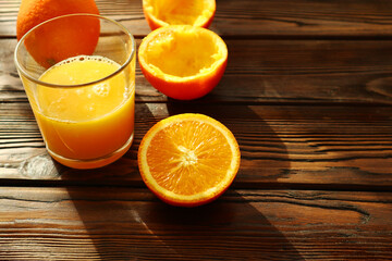  Fresh ripe juicy oranges on wooden background   