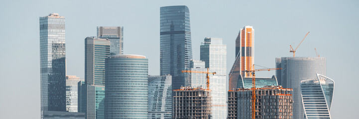 Panorama with skyscrapers. Modern residential and office buildings. Beautiful cityscape. Wide...