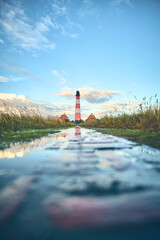 Historic Pathway to Lighthouse at north sea coast. High quality photo - 731626574