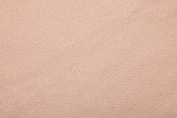 Texture of beige fabric as background, top view