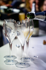 Visitors drink of sparkling wine champagne on outdoor winter festival in December on Avenue de Champagne, Epernay, Champagne region, France