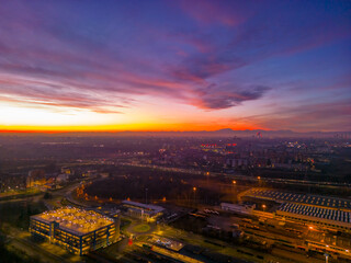 Fototapeta premium San Donato Milanese City in Italy with beautiful Sunset . Cityscape from drone. Italy, Lombardy, Milan, San Donato Milanese