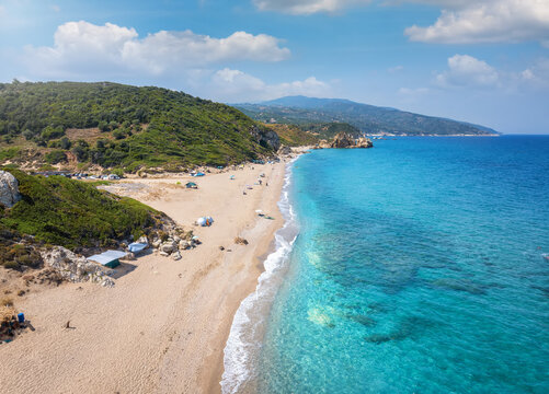 Aerial view of the beautiful beach of Melani, Mount Pelion, Greece, with turquoise sea and fine, golden sand