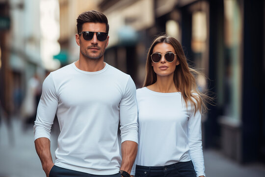 Man and woman wearing blank white long sleeve t-shirt
