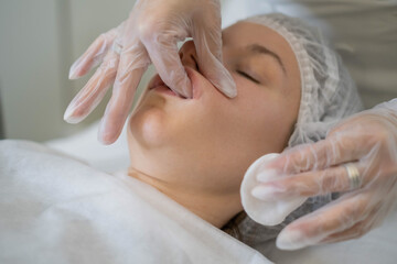 Skilled hands deliver a buccal massage, targeting inner cheek muscles. It's a secret behind many...