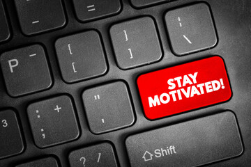 Stay motivated! text button on keyboard, concept background