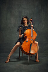 Fototapeta na wymiar Female celloist sitting with cello on dark green background. Book cover for musician's memoir, emphasizing personal and artistic growth. Concept of classical art, retro style, music, inspiration