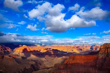 Grand Canyon, a view from Hermit Road on a sunny winter day with massive puffy clouds and clean air