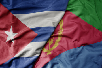 big waving national colorful flag of eritrea and national flag of cuba .