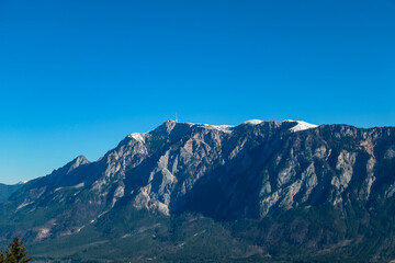 Fototapeta na wymiar Panoramic view of majestic mountain peak Dobratsch seen from Dreilaendereck (Pec, Often, Monte Forno) in untamed Karawanks, Carinthia, Austria. Alpine landscape in spring in Austrian Alps. Wanderlust