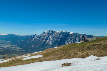 Panoramic view of majestic mountain peak Dobratsch seen from Dreilaendereck (Pec, Often, Monte Forno) in untamed Karawanks, Carinthia, Austria. Alpine landscape in spring in Austrian Alps. Wanderlust