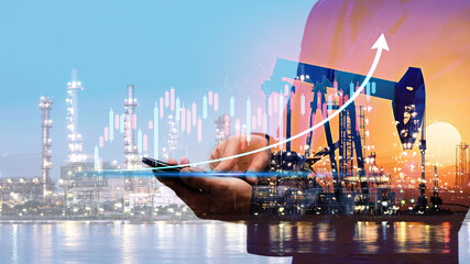 Businessman using digital tablet. Business global internet connection application technology digital marketing, Crude Oil pump oil rig energy industrial machine background. Crude oil increase price