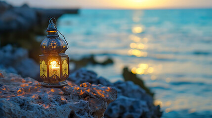Arabic Lantern on rock with blurry sea beach Ramadan Kareem concept background