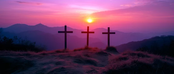 Gordijnen Crucifixion and Resurrection of Jesus at sunset. Three wooden crosses against beautiful sunset in the mountains. Catholicism symbols. Easter concept. © Elena Uve