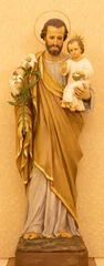 Schilderijen op glas MONOPOLI, ITALY - MARCH 6, 2022: The statue of St. Joseph  in the church Chiesa di San Antonio by unknown artist.  © Renáta Sedmáková