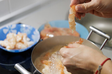 Fish in sauce with shrimp. Step by step preparation. peeling shrimp