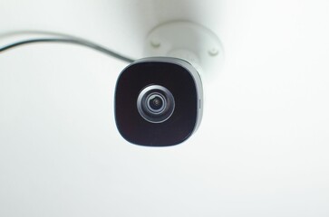 a camera with a metal ring attached to it's side