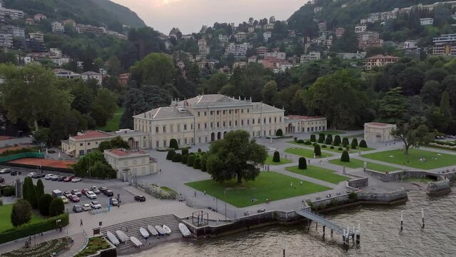 Aerial footage showing the Villa Olmo building by a pond in Como, Italy