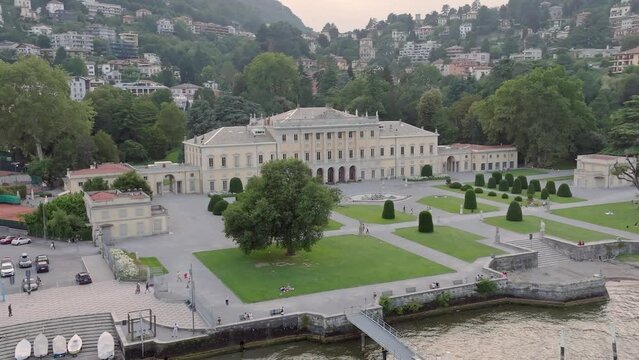 Drone footage showing the Villa Olmo building by a pond in Como, Italy