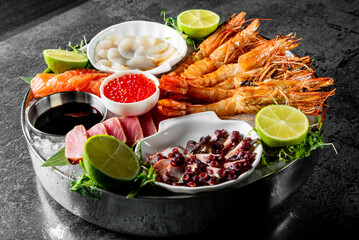 Set Seafood with salmon fish, tuna, shrimp on plate