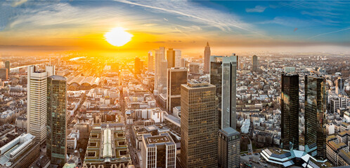 aerial view to skyline of Frankfurt with skyscraper in dawn and spectacular sunset - obrazy, fototapety, plakaty
