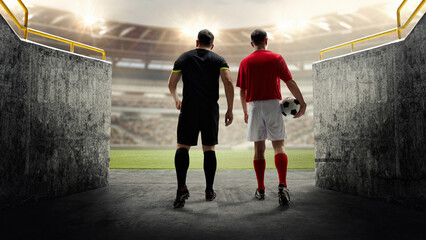 3D render of soccer stadium. Two men, opponents in game, soccer players looking on empty field with...