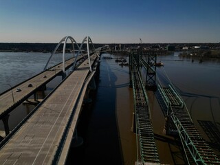 Fototapeta na wymiar Aerial view of a bridge running over the Mississippi River in Davenport