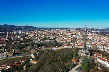 Fototapeta na wymiar Cityscape of Lyon against the background of a clear blue sky. France.