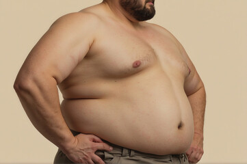 Cropped fat male with protruding belly