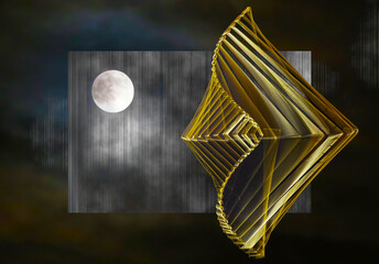 A golden kinetic wind spinner with moon background abstract design