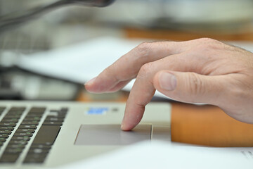 person typing on a laptop