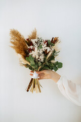 elegant wedding bouquet of dried flowers