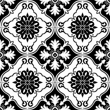 Black and white vintage floral seamless pattern with ornate swirls and nature-inspired elements for wallpaper, fabric, and textile design