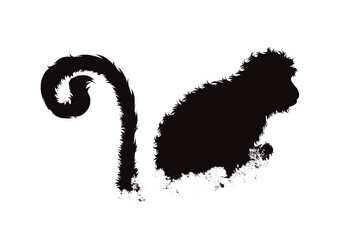 Silhouette of a monkey with a forest on a white background. A symbol of wild life and nature.