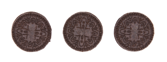 Top view of three black cookies with white cream in a row isolated on a cutout PNG transparent background