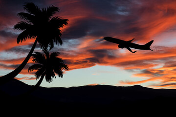Airplane flying over sunset landscape. Travel and transportation.