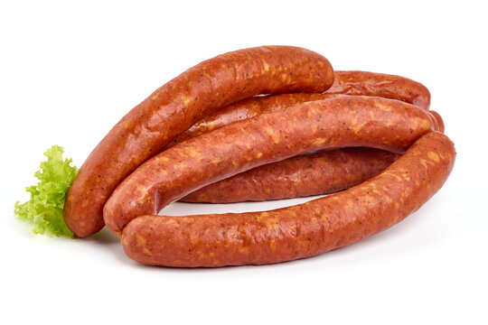 Long thin smoked sausages, isolated on white background.