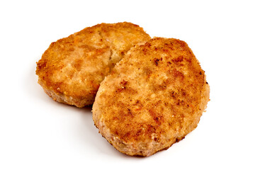 Fried pork schnitzels in breadcrumbs, isolated on white background.