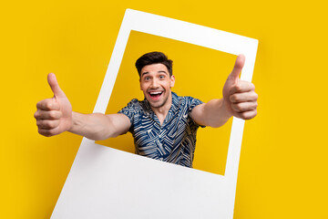 Photo of astonished ecstatic man with bristle dressed blue clothes showing thumbs up from photozone...