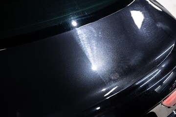 Before and after effect polishing car body varnish in car detailing studio - obrazy, fototapety, plakaty