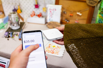 Paying for items at small side hustle business with square payment terminal