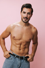 Fototapeta premium Fitness man naked background sport torso body muscular lifestyle pink muscle sexy