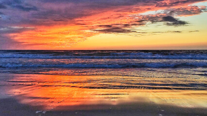 Fototapeta na wymiar Enjoying the sunrises on Cabanyal beach