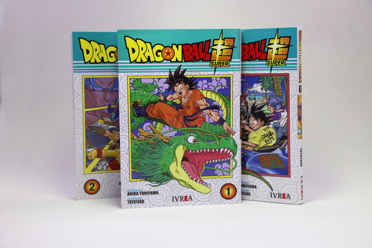 Dragon Ball Super manga books on isolated white background. Copy Space. Japanese anime comic books for children with the characters of Goku, Vegeta and their friends.