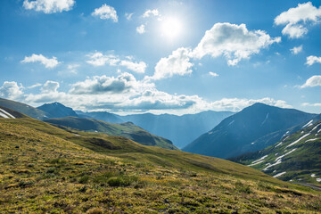 Early morning sunshine in the mountain tundra valley