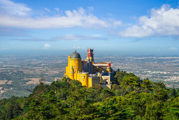 pena palace on the top of hill in sintra, portugal