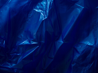 Dark blue plastic bag texture for environmental background.